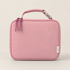 Nom insulated lunch bag in Pink, front view with padded handle and insulated design.